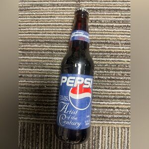 New unopened. Elvis 2000 cola